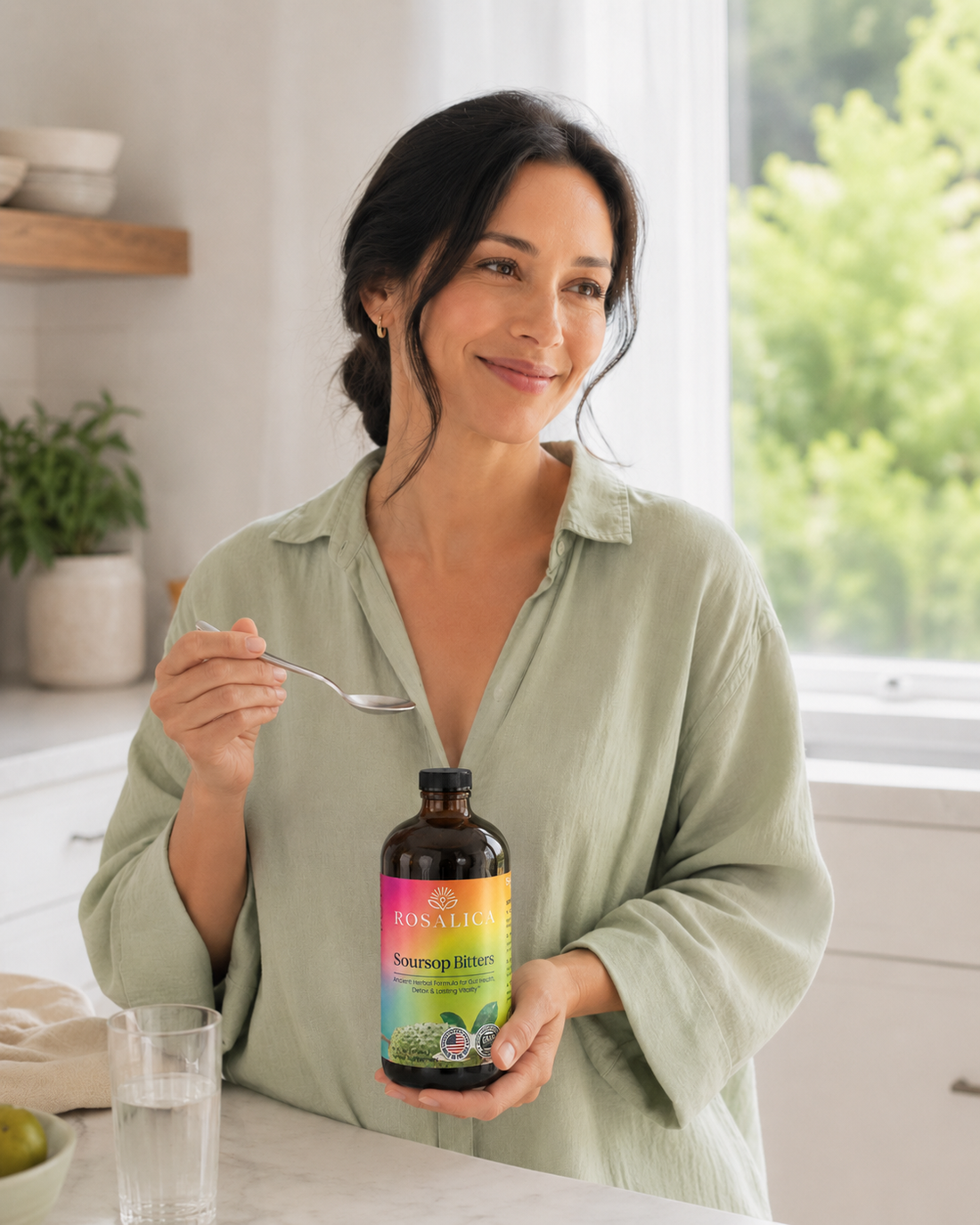 Customer enjoying her ROSALICA Soursop Bitters wellness routine