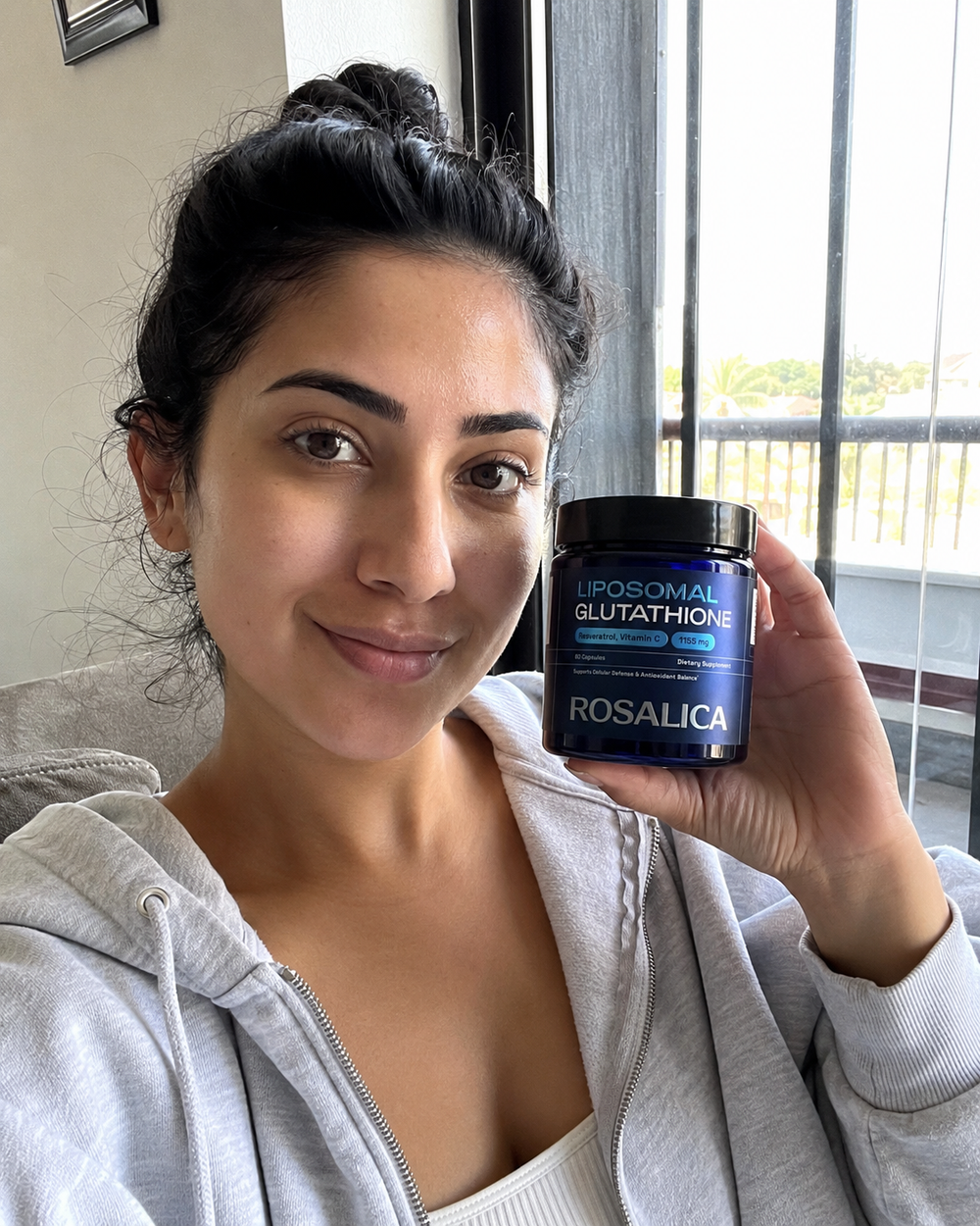 Rosalica customer holding the product